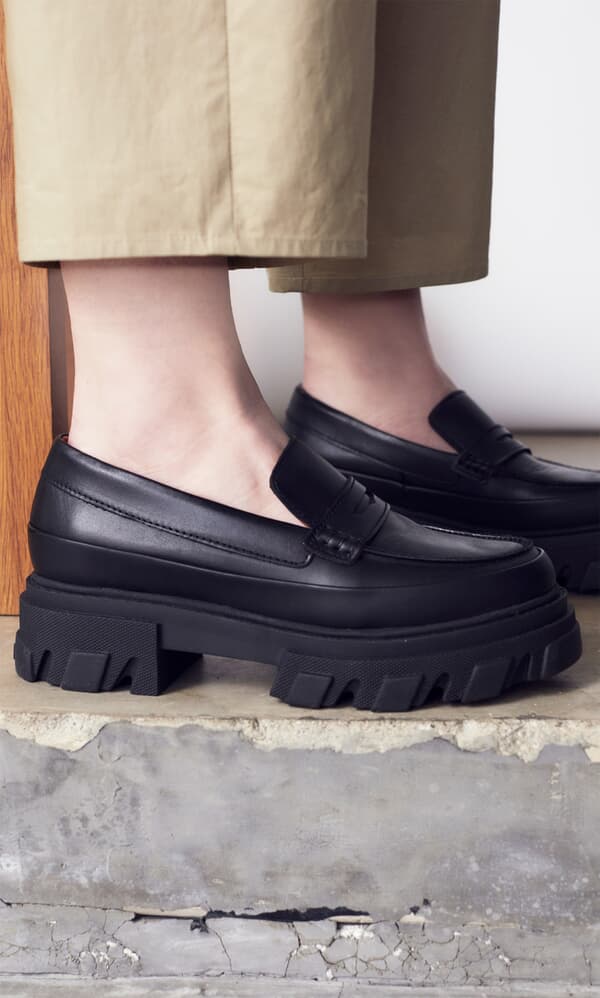 Matte black loafers by Ganni - SS22