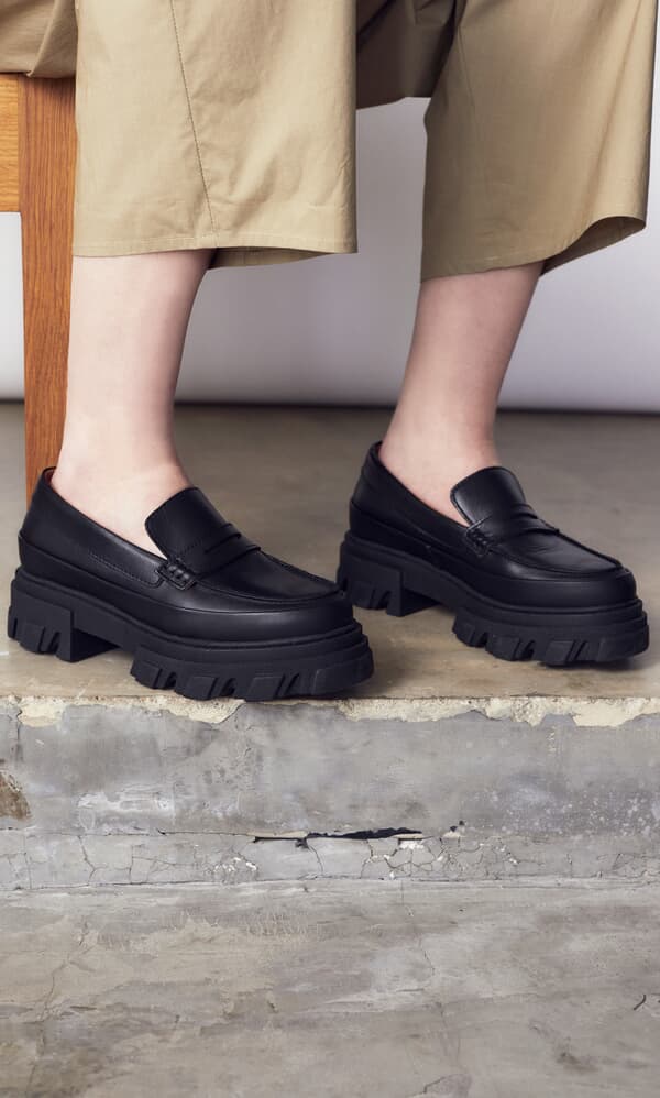 Matte black loafers by Ganni - SS22