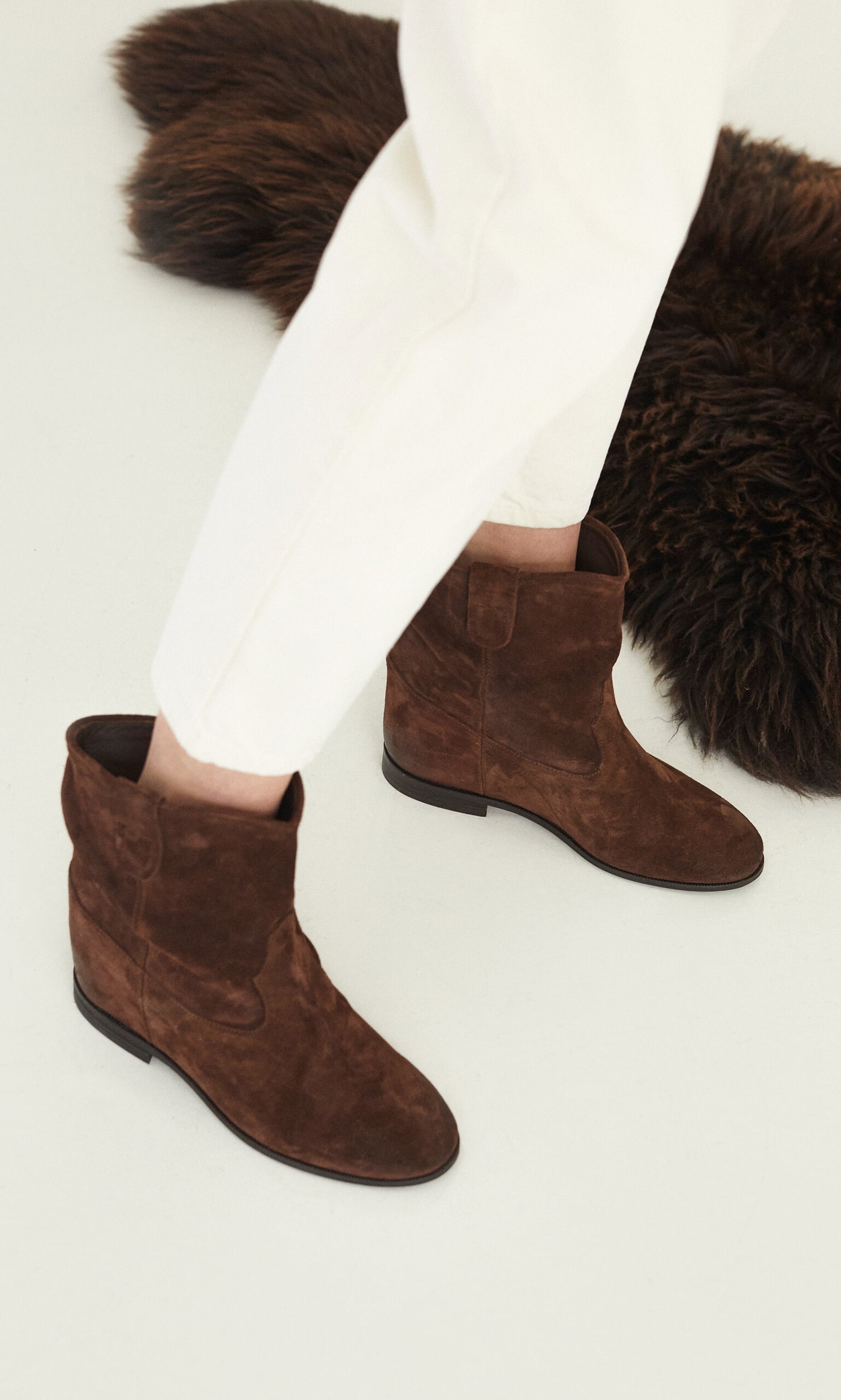 Elevated suede boots