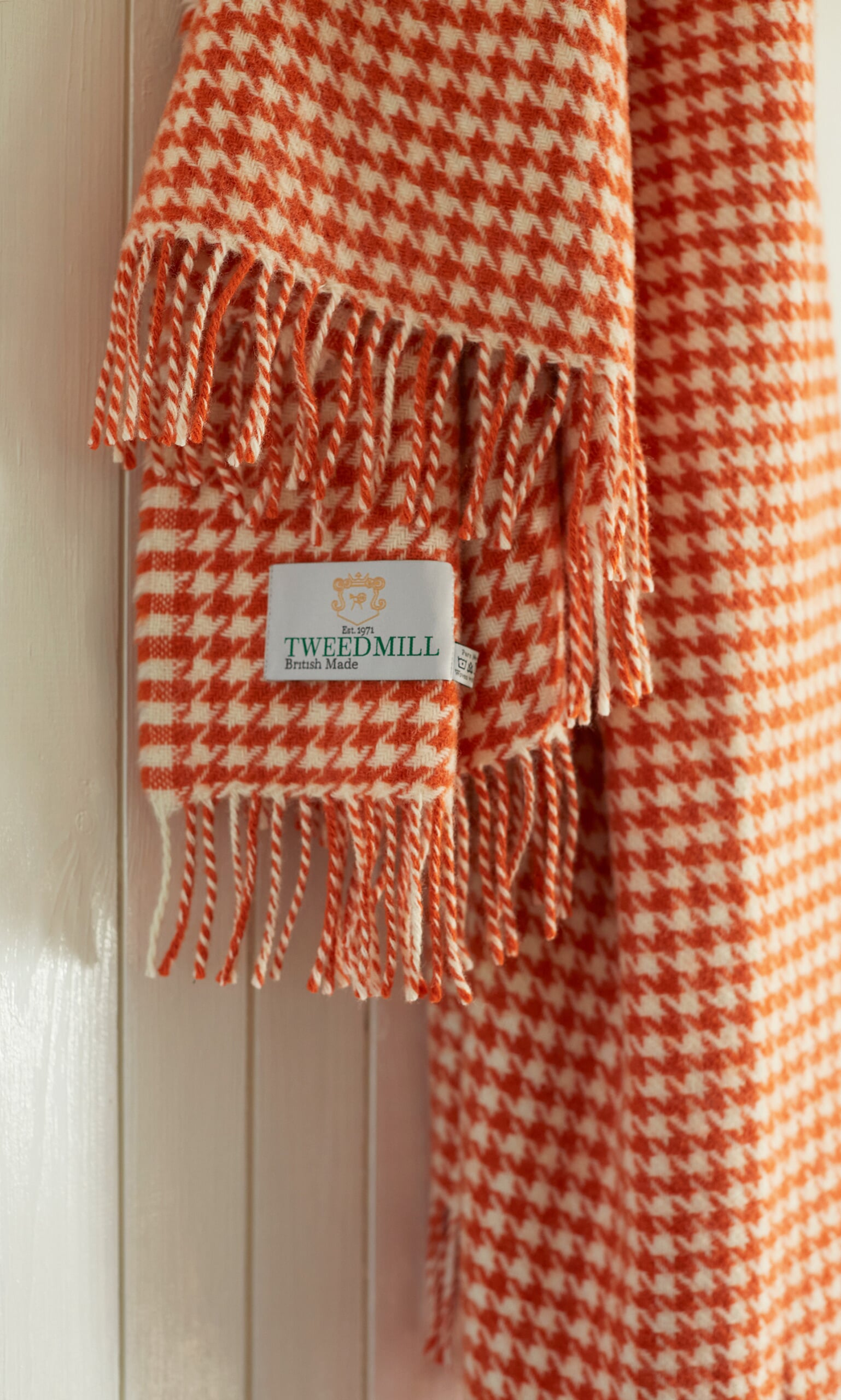 Orange houndstooth throw