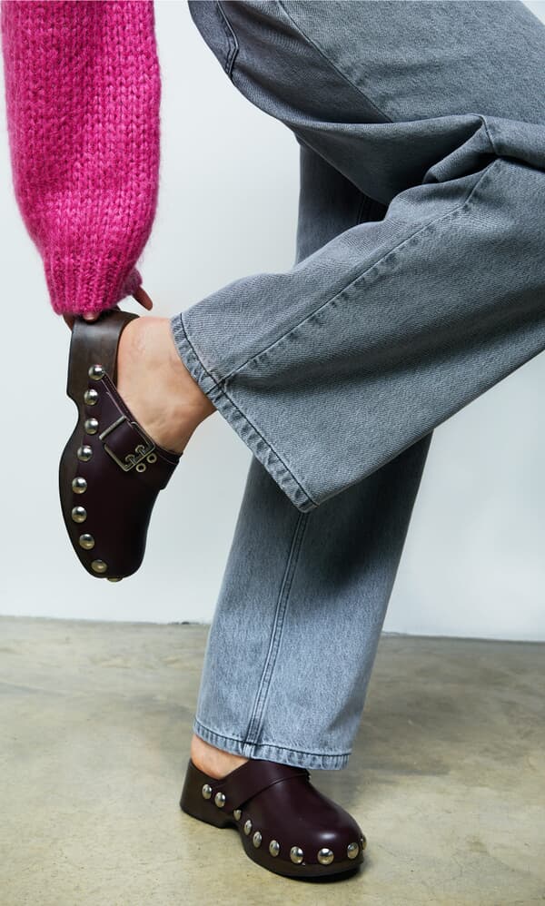 Leather studded mules by Ganni