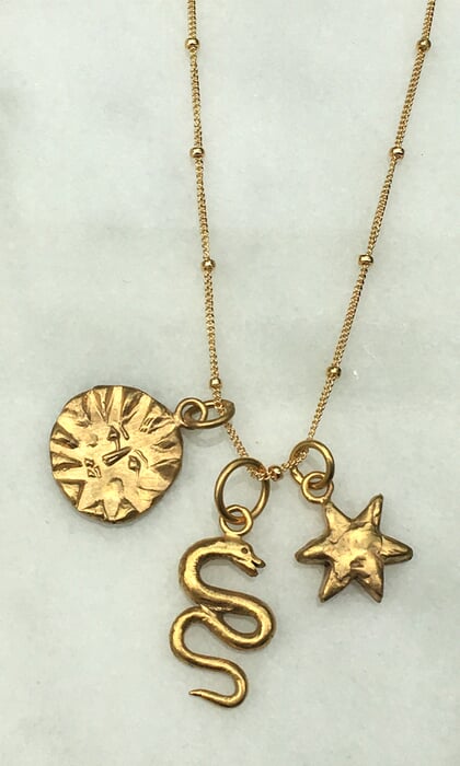 Talisman charm necklace in yellow gold