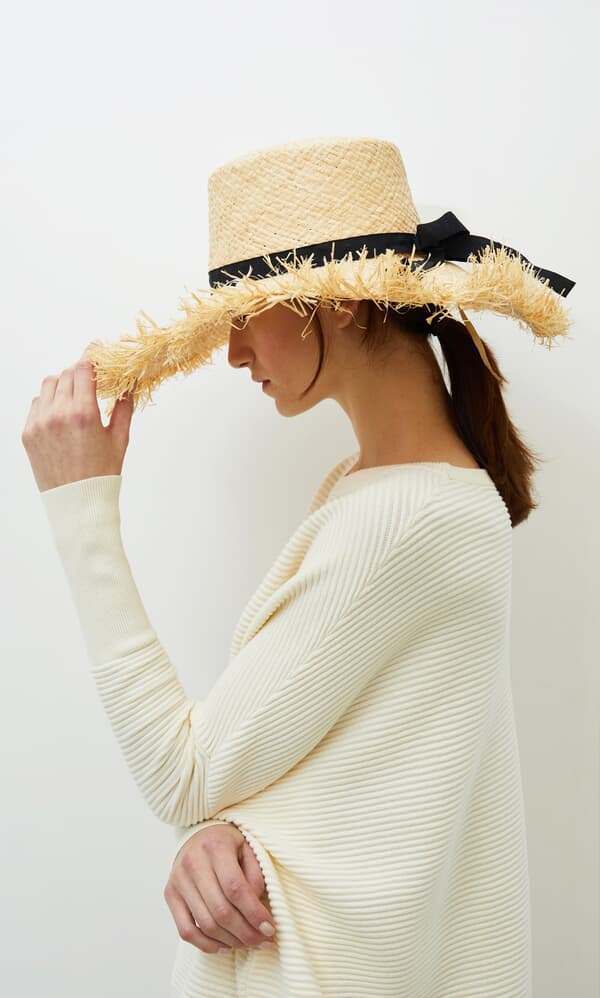 Frayed straw hat