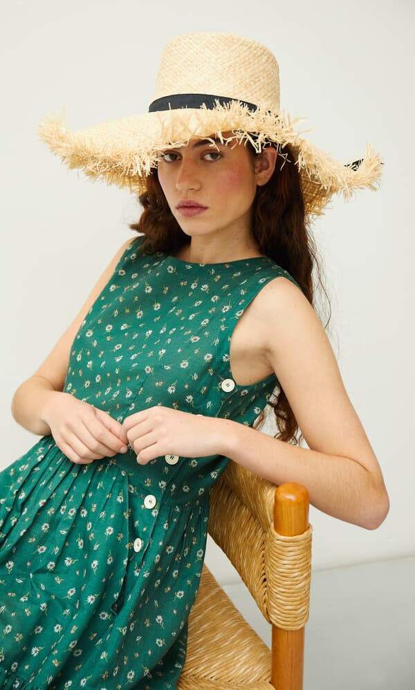 Frayed straw hat