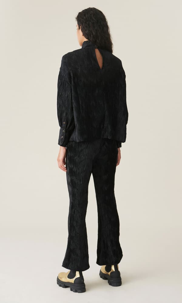 Black pleated top by GANNI